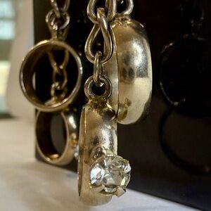 Vintage dangle earrings with miniature gold-tone wedding and engagement rings